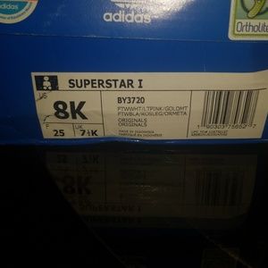 White and pink toddler girls Adidas